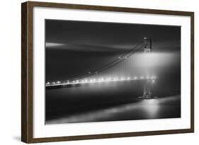 Black And White View Of The Golden Gate Bridge At Night With Silky Low Fog Around The Tower-Joe Azure-Framed Photographic Print