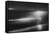 Black And White View Of The Golden Gate Bridge At Night With Silky Low Fog Around The Tower-Joe Azure-Framed Stretched Canvas