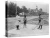 Black Children Playing Golf Photograph-Lantern Press-Stretched Canvas