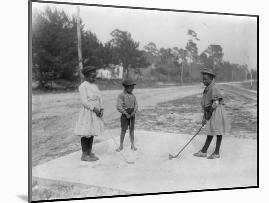 Black Children Playing Golf Photograph-Lantern Press-Mounted Art Print