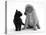 Black Domestic Kitten (Felis Catus) and Labrador Puppy (Canis Familiaris) Looking at Each Other-Jane Burton-Stretched Canvas