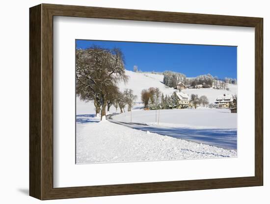 Black Forest Farmhouses in Winter Near Sankt Peter (Saint Peter)-Miles Ertman-Framed Photographic Print