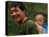 Black Lisu Carrying Baby at Market near Fugong, Nujiang Prefecture, Yunnan Province, China-Pete Oxford-Stretched Canvas