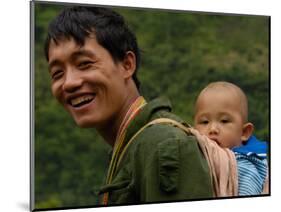 Black Lisu Carrying Baby at Market near Fugong, Nujiang Prefecture, Yunnan Province, China-Pete Oxford-Mounted Photographic Print