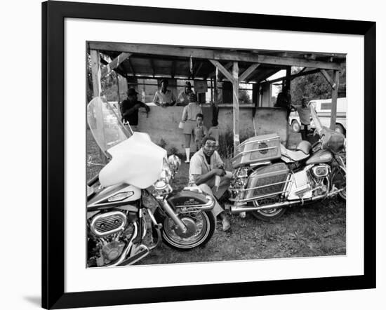 Black Motorcyclist of the Big Circle Motorcycle Association Sitting Between Harley Davidson Bikes-John Shearer-Framed Photographic Print