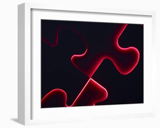 Black Puzzle with Red Light Shining Through the Cracks-null-Framed Photographic Print