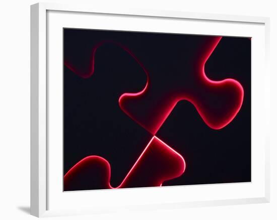 Black Puzzle with Red Light Shining Through the Cracks-null-Framed Photographic Print