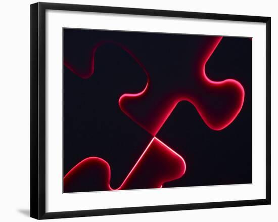 Black Puzzle with Red Light Shining Through the Cracks-null-Framed Photographic Print