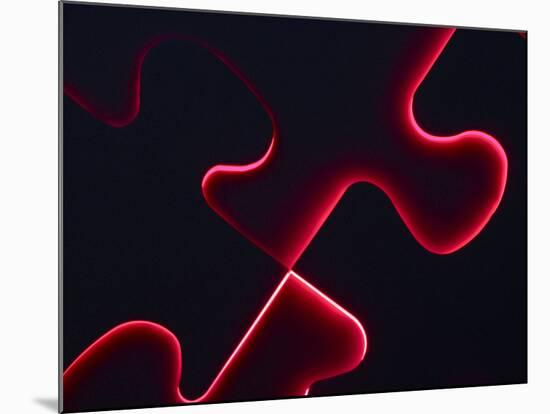 Black Puzzle with Red Light Shining Through the Cracks-null-Mounted Photographic Print