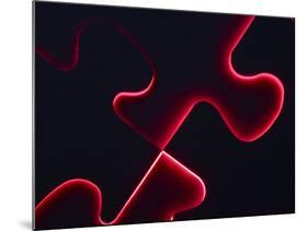 Black Puzzle with Red Light Shining Through the Cracks-null-Mounted Photographic Print