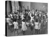 Black Teacher Leading Children in Dancing to Nursery Rhymes in Class at the National War Memorial-null-Stretched Canvas