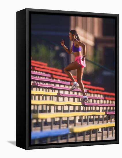 Black Woman Running Up Stairs-null-Framed Stretched Canvas