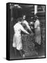 Black Women Laborers Weighing Wire Coils and Recording Weights to Establish Wage Rates, in Factory-F^p^ Burke-Framed Stretched Canvas