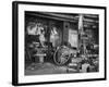 Blacksmith Working in His Shop-John Phillips-Framed Photographic Print