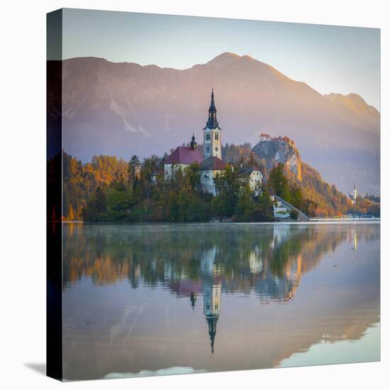 Bled Island with the Church of the Assumption and Bled Castle Illuminated at Dusk, Lake Bled-Doug Pearson-Stretched Canvas