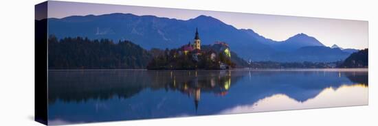 Bled Island with the Church of the Assumption and Bled Castle Illuminated at Dusk, Lake Bled-Doug Pearson-Stretched Canvas