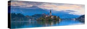 Bled Island with the Church of the Assumption and Bled Castle Illuminated at Dusk, Lake Bled-Doug Pearson-Stretched Canvas