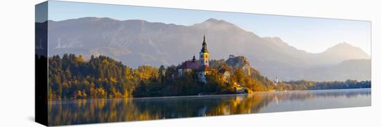 Bled Island with the Church of the Assumption and Bled Castle Illuminated at Dusk, Lake Bled-Doug Pearson-Stretched Canvas