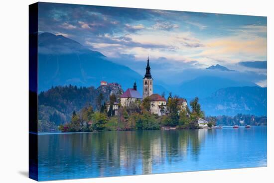 Bled Island with the Church of the Assumption and Bled Castle Illuminated at Dusk, Lake Bled-Doug Pearson-Stretched Canvas