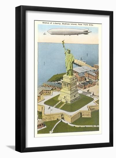 Blimp over Statue of Liberty, New York City-null-Framed Art Print