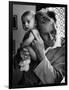 Blind Doctor Albert A. Nast Holding Ear to Back of 3 Month Old Instead of Using a Stethoscope-Thomas D. Mcavoy-Framed Photographic Print