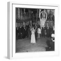 Blind Folded Woman Trying to Split Open the Pinata, During Traditional Pre-Christmas Celebration-Ed Clark-Framed Photographic Print