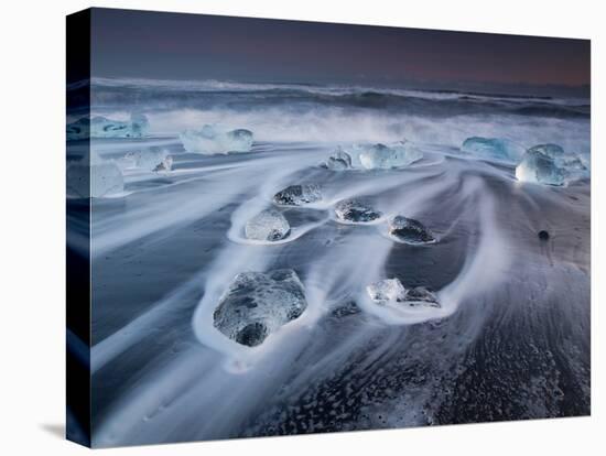 Blocks of Ice on the Black Sand Beach in Southern Iceland-Alex Saberi-Stretched Canvas