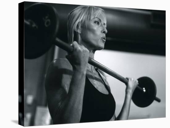 Blond Woman Weight Training-null-Stretched Canvas