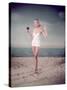 Blonde Pin-Up on Beach-Charles Woof-Stretched Canvas