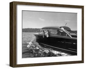 Blondie, the Pet Lion, Fascinated by the Water as She Takes Her First Ride in Chris Craft Motorboat-Joe Scherschel-Framed Photographic Print