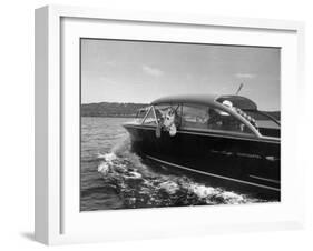 Blondie, the Pet Lion, Fascinated by the Water as She Takes Her First Ride in Chris Craft Motorboat-Joe Scherschel-Framed Photographic Print