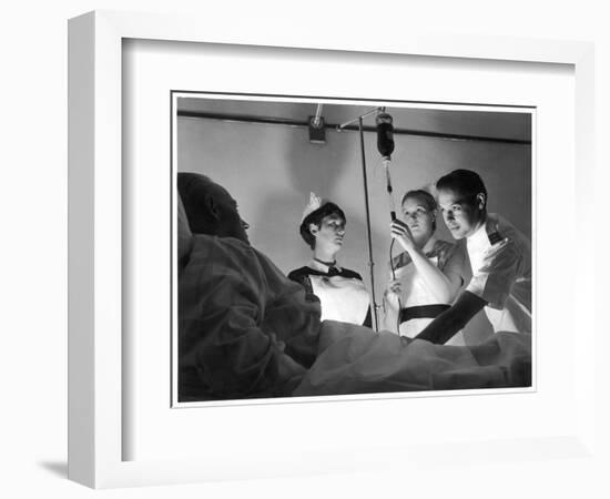 Blood Transfusion: Blood Being Given to a Patient from a Drip-Feed Bottle at St. James's Hospital-null-Framed Art Print