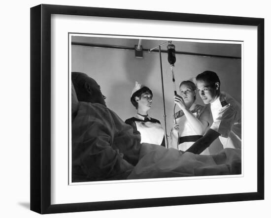 Blood Transfusion: Blood Being Given to a Patient from a Drip-Feed Bottle at St. James's Hospital-null-Framed Art Print