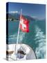 Blowing rear flag with Swiss cross on ship in the Lake Geneva-enricocacciafotografie-Stretched Canvas