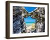 Blue and turquoise Sargasso Sea, glimpsed through an arch in the island's distinctive rocks-Barry Davis-Framed Photographic Print