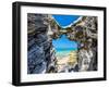 Blue and turquoise Sargasso Sea, glimpsed through an arch in the island's distinctive rocks-Barry Davis-Framed Photographic Print