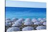 Blue and white beach parasols, Nice, Alpes Maritimes, Cote d'Azur, Provence, France, Mediterranean,-Fraser Hall-Stretched Canvas