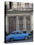 Blue Car Parked Outside a Shabby House in Old Havana, Cuba, West Indies, Central America-Mawson Mark-Stretched Canvas