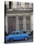 Blue Car Parked Outside a Shabby House in Old Havana, Cuba, West Indies, Central America-Mawson Mark-Stretched Canvas