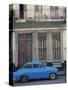 Blue Car Parked Outside a Shabby House in Old Havana, Cuba, West Indies, Central America-Mawson Mark-Stretched Canvas