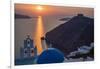 Blue dome church and famous three bells with cross and steeple in Fira, Santorini, Greece.-Michele Niles-Framed Photographic Print