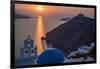 Blue dome church and famous three bells with cross and steeple in Fira, Santorini, Greece.-Michele Niles-Framed Photographic Print