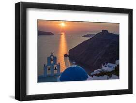 Blue dome church and famous three bells with cross and steeple in Fira, Santorini, Greece.-Michele Niles-Framed Photographic Print