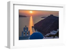 Blue dome church and famous three bells with cross and steeple in Fira, Santorini, Greece.-Michele Niles-Framed Photographic Print