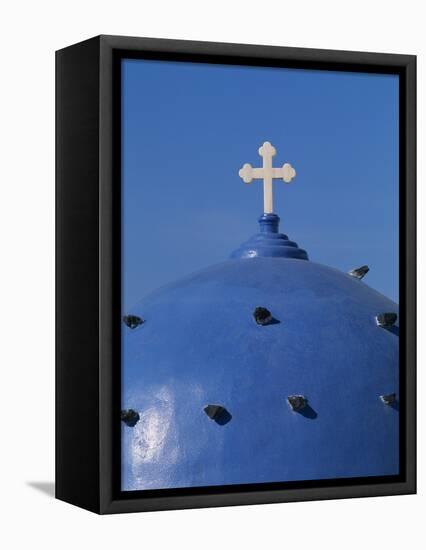 Blue dome of a church with cross on Santorin, Greece-Murat Taner-Framed Stretched Canvas