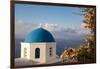 Blue domed Greek Orthodox church with bougainvillea flowers in Oia, Santorini, Greece.-Michele Niles-Framed Photographic Print