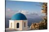 Blue domed Greek Orthodox church with bougainvillea flowers in Oia, Santorini, Greece.-Michele Niles-Stretched Canvas