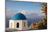 Blue domed Greek Orthodox church with bougainvillea flowers in Oia, Santorini, Greece.-Michele Niles-Mounted Photographic Print