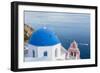 Blue domed white church overlooking boat in Aegean Sea, Santorini, Cyclades-Ed Hasler-Framed Photographic Print