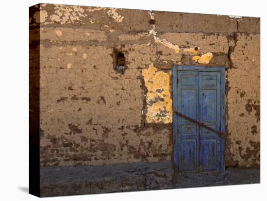 Blue Door, Luxor Town, Egypt-Clive Nolan-Stretched Canvas